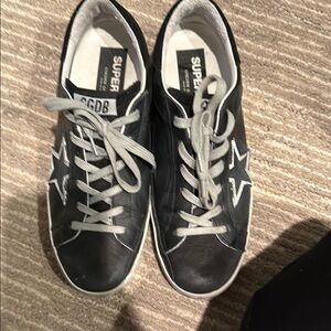 Women’s Golden Goose superstar sneakers limited edition black size 9.5